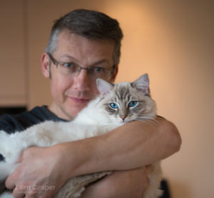 Ragdoll Casper seal point mitted lynx ragdoll with his human cat photographer and slave.